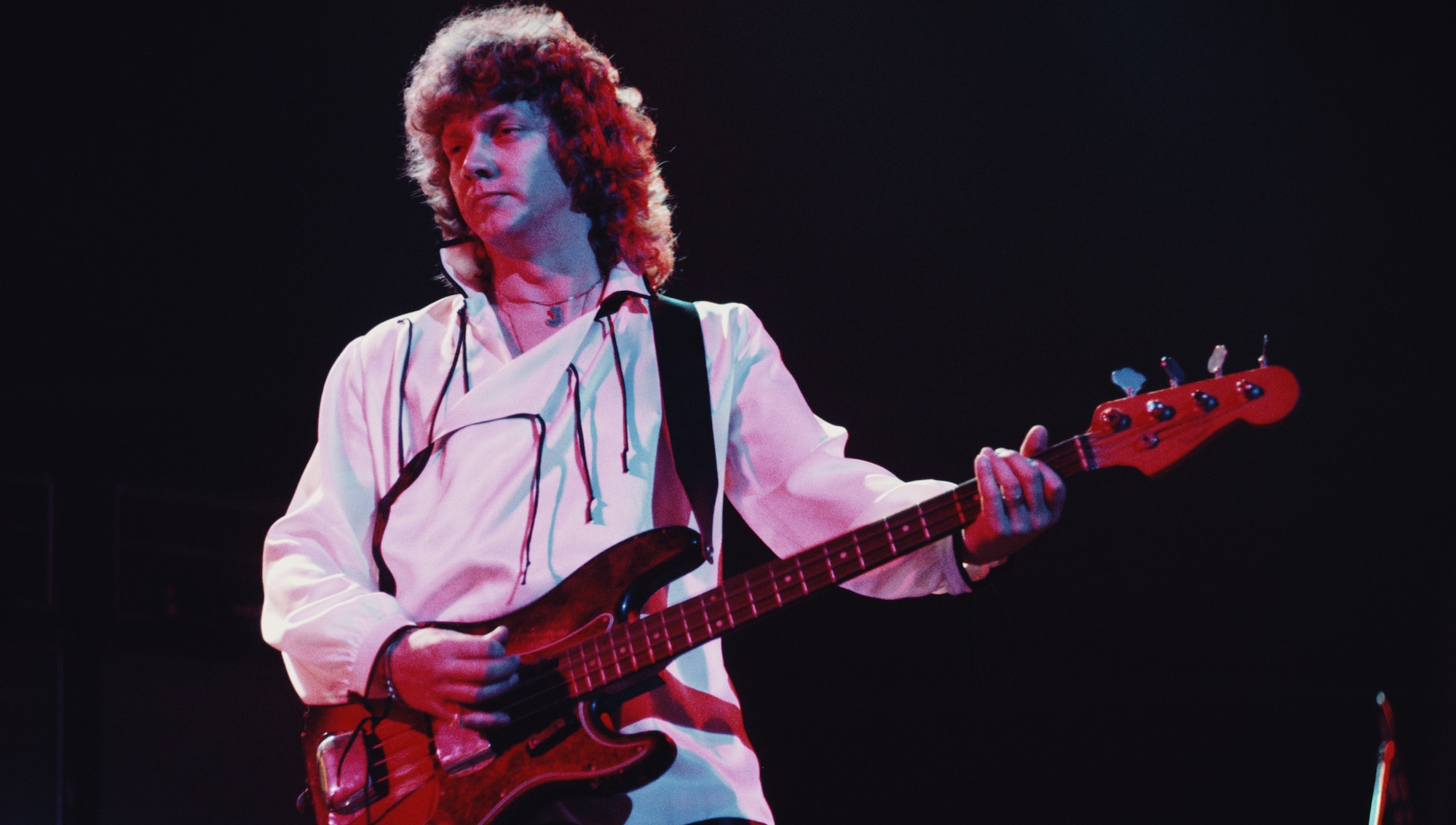 John Lodge performs onstage with the Moody Blues in 1975