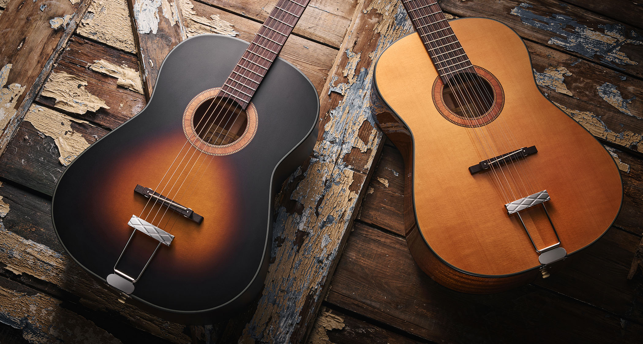 Framus Hootenanny 6-string and 12-string: inspired the originals used by John Lennon in the 1960s, these reissued acoustics are photographed together against distressed wooden flooring.
